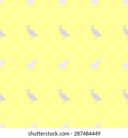 Seamless pattern with animal farm goose gray silhouette on a yellow background
