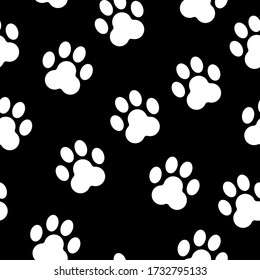 Seamless pattern with animal paw prints silhouette. Black and white. Cute and funny. Cartoon style. Cats and dogs. Pet shop. Veterinary. For postcards, textile, wallpaper and wrapping paper