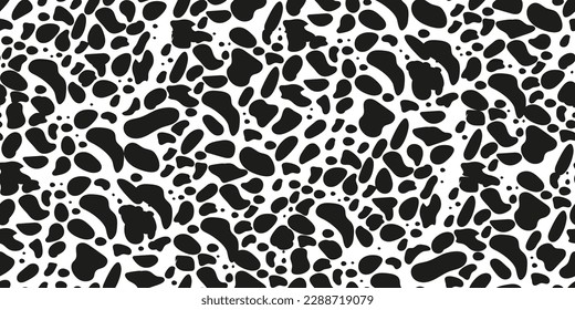 Seamless pattern with animal print dolmatian. Black spots. Suitable for printing and textiles.
