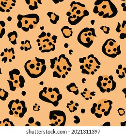 Seamless pattern with animal print. Mammalian fur. Camouflage of predators cheetah, leopard, jaguar. Background for printing. Vector illustration.