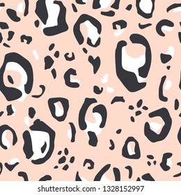 Seamless pattern with animal print. Trendy abstract texture with leopard skin. Fashion vector illustration.