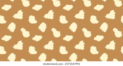 Seamless pattern with animal print in warm beige tones. Creamy colored deer skin design background with irregular textured spots for textiles, wallpapers, wrapping paper, fabric.