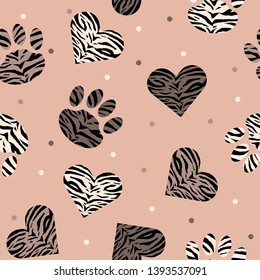 Seamless pattern of animal skin in shape of heart and paw: leopard, tiger and zebra. Trendy animal print. Fashion vector illustration.