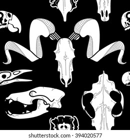 Seamless pattern with animal skull in black color