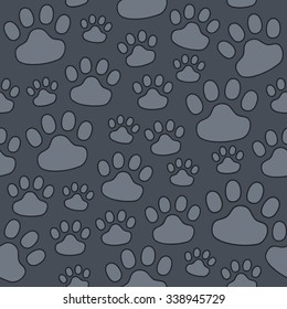 Seamless pattern of animal tracks, hand-drawn. Vector illustration on dark-gray background.