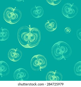 Seamless pattern with apples cut in half