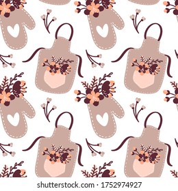 Seamless pattern with Apron, Oven Mitt, Potholder with vintage flowers on white background. Cute kitchen textile vector illustration in cartoon simple flat style.