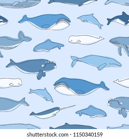 Seamless pattern with aquatic animals or marine mammals hand drawn on blue background - whales, narwhal, dolphins, cachalot, beluga. Vector illustration for textile print, wrapping paper, wallpaper.