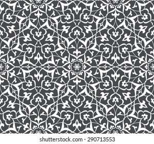 Seamless pattern in Arabic style. Intersecting curved elegant stylized leaves and scrolls forming abstract floral ornament. Arabesque.