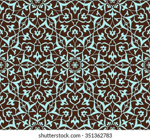 Seamless pattern in Arabic style. Intersecting curved elegant stylized leaves and scrolls forming abstract floral ornament in brown and blue color. Arabesque.