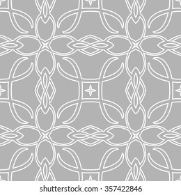 Seamless pattern in arabic style. Intersecting curved elegant lines and scrolls forming abstract floral ornament. Arabesque.