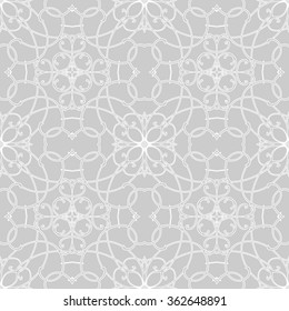 Seamless pattern in arabic style. Intersecting curved elegant lines and scrolls forming abstract floral ornament.