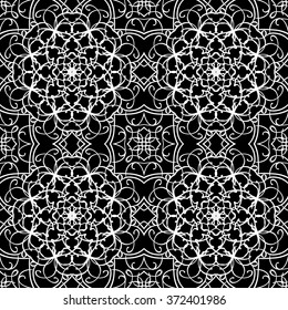 Seamless pattern in arabic style. Intersecting curved elegant lines and scrolls forming abstract floral ornament. Arabesque.