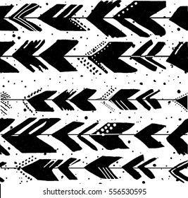 Seamless pattern with arrows in ethnic style .