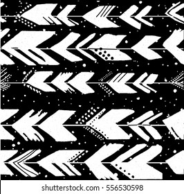 Seamless pattern with arrows in ethnic style .