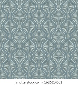 Seamless pattern in Art Deco style. Rounded shapes in the form of a leaf on a blue background