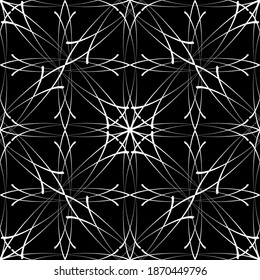 Seamless pattern in art Nouveau style. Complex geometric pattern. White pattern on a black background. Mesh pattern. For decorating fabric, paper, Wallpaper, and packaging.