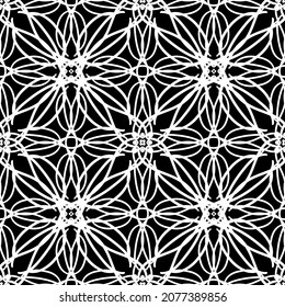 Seamless pattern in art Nouveau style. Complex geometric pattern. White pattern on a black background. Mesh pattern. For decorating fabric, paper, Wallpaper and packaging.