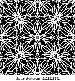 Seamless pattern in the Art Nouveau style. Modern stylish texture. Complex geometric pattern.Mesh pattern.White ornament on a black background.For decorating fabric, paper, wallpaper and packaging.