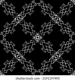 Seamless pattern in art Nouveau style. Complex geometric pattern. White pattern on a black background. Mesh pattern. For decorating fabric, paper, Wallpaper, and packaging.