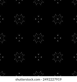Seamless pattern in art Nouveau style. Complex geometric pattern. White pattern on a black background. Mesh pattern. For decorating fabric, paper, Wallpaper, and packaging.