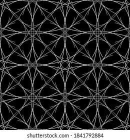 Seamless pattern in art Nouveau style.Complex geometric pattern.Mesh pattern.A pattern of fine lines.White ornament on a black background.For decorating fabric, paper, Wallpaper, and packaging.