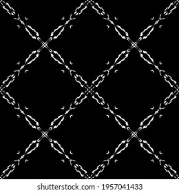 Seamless pattern in art Nouveau style.Complex geometric pattern.Mesh pattern.A pattern of fine lines.White ornament on a black background.For decorating fabric, paper, Wallpaper, and packaging.