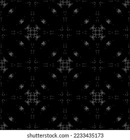 Seamless pattern in art Nouveau style.Complex geometric pattern.Mesh pattern.A pattern of fine lines.White ornament on a black background.For decorating fabric, paper, Wallpaper, and packaging.