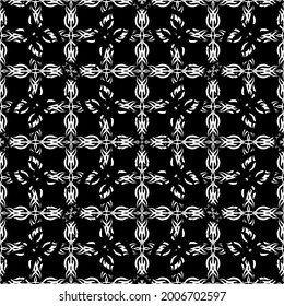 Seamless pattern in art Nouveau style.Mesh pattern. Complex geometric pattern. White pattern on a black background. For decorating fabric, paper, Wallpaper, and packaging.