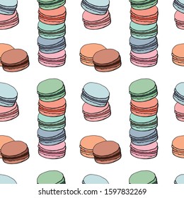 Seamless pattern with assorted varicoloured macaroons on white background.