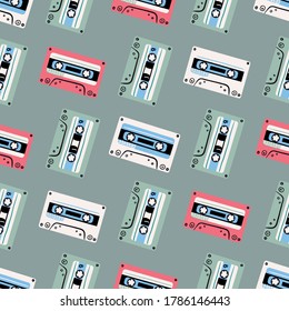 Seamless pattern with  audio Cassettes. 80`s. Vector illustration