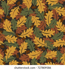 Seamless pattern. Autumn background. Green, brown and yellow oak leaves. It can be used for printing on fabric, wallpaper, design and wrapping