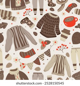 Seamless pattern of autumn beautiful season. Foliage, Sock, Acorns and pine cones, Warm beverages, Sweaters and scarves. Vector illustration.