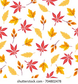 Seamless pattern with autumn branches and leaves on white background. Floral hand drawn ornament in yellow and red colors. Bright background for printing on fabric, wallpaper and paper. Vector