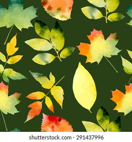 Seamless pattern with autumn bright leaves on a green background. Watercolor. Vector illustration