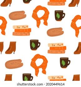 Seamless pattern with autumn clothes and books and shoes.