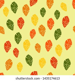 Seamless pattern of autumn colored leaves. Vector illustration