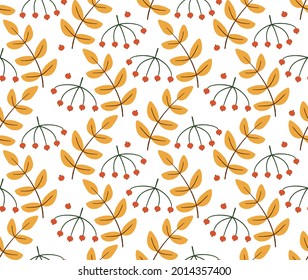 Patrón sin foco con hojas coloridas de otoño y bayas de rowan.