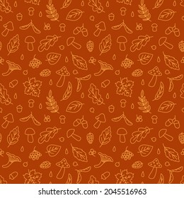 Seamless pattern with autumn doodles. Contour image of fallen leaves of maple, oak, linden, rowan, willow and acorns. Background with orange drawings for seasonal natural decor. Vector autumn decor