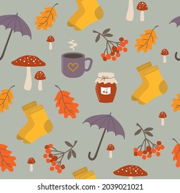 Seamless pattern with autumn elements. Cute and cozy seasonal items in a repeat pattern.