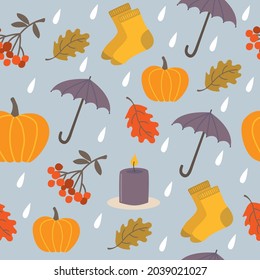 Seamless pattern with autumn elements. Cute and cozy seasonal items. Rainy weather. Repeat pattern.