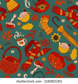 Seamless pattern with autumn items. Vector graphics.