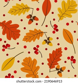 seamless pattern with autumn leaves, acorns and berries