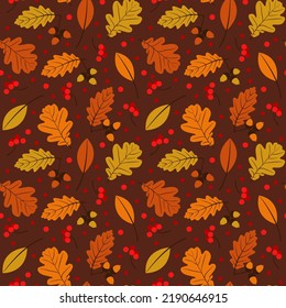seamless pattern with autumn leaves, acorns and berries