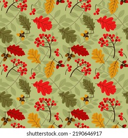 seamless pattern with autumn leaves, acorns and berries