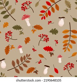 seamless pattern with autumn leaves, acorns, mushrooms and berries