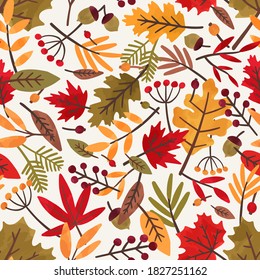 Seamless pattern with autumn leaves and berries. Colorful repeatable backdrop with oak, rowan and maple leaves and acorns for wrapping paper. Flat vector cartoon illustration of bright fall foliage