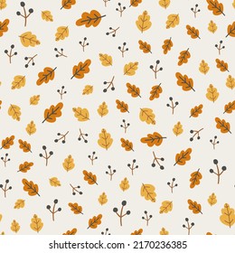 Seamless pattern with autumn leaves and berries. Colorful repeating background with oak leaves for wrapping paper. Flat vector cartoon illustration of bright fall foliage.