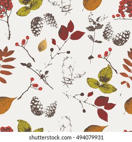 seamless pattern of autumn leaves, branches, berries, cones. vector