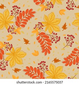 Seamless pattern with autumn leaves of chestnut and rowan on beije background. For textile, giftpaper, wallpaper.